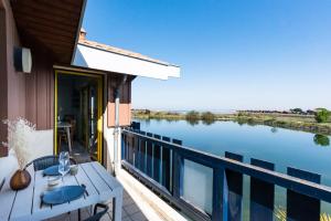 Appartements SUR PILOTIS☆ 4PERS ☆vue incroyable sur le bassin : photos des chambres