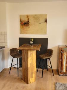 Apartment 1 mit Terrasse und PKW-Stellplatz