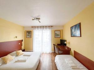 Hotels Hotel les Alignements : photos des chambres
