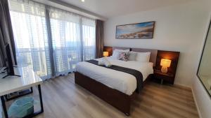 OceanView Oasis 2BR Apt - 5Mins to Beach - Family Resort