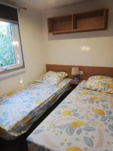 Campings Mobil Home 3 ch, CLIMATISE PAISIBLE : photos des chambres