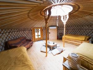 Tentes de luxe Yourte A bourlon : photos des chambres