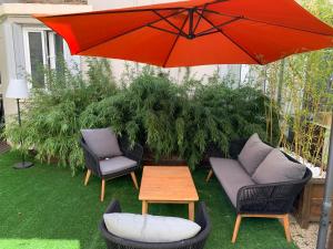 Appartements Appartement cosy en centre ville avec SPA et jardin : photos des chambres