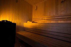 Chalets Charmante Cabane dans les arbres avec jacuzzi et sauna : photos des chambres