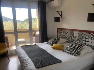 Hotels La Picholine : photos des chambres