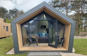 Tiny House in het groen, aan zee met privé Hottub