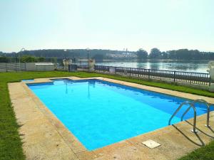 Precioso apartamento con piscina y jardín frente a la Toja