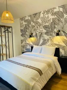 Appartement 2 chambres avec terrasse vue sur jardin arboré - La Cluse et Mijoux