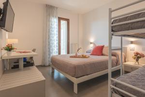 Camera Matrimoniale con Letto Supplementare