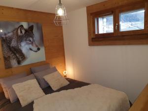 Appartements Le Repaire des Loups - Appart neuf 12 pers 4 chambres - location a la semaine : photos des chambres