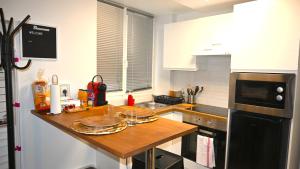 Appartements Class&Nomad Appt 10mn Aeroport Roissy CDG : photos des chambres