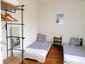 Maisons de vacances Maison de 3 chambres a Larmor Plage a 400 m de la plage avec jardin clos et wifi : photos des chambres