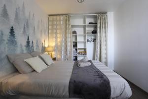 Appartements Cocon annecien entre lac et montagne classe 1 etoile : photos des chambres