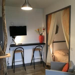Appartements La Tour Des Quatre Chemins : photos des chambres