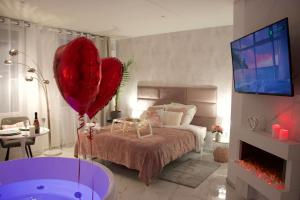 Appartements SPA Romantique ... Esprit LOVE : photos des chambres