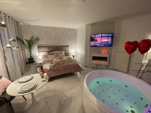 Appartements SPA Romantique ... Esprit LOVE : photos des chambres