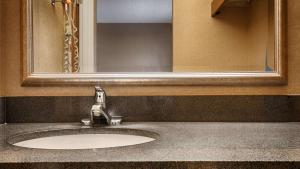 King Suite with Sofa Bed room in Best Western Woodhaven Inn