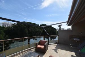 Appartements T2 vue canal et remparts d'Aigues Mortes : photos des chambres