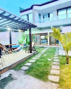 Casa temporada com piscina - Jucu