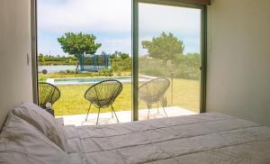 HOP PRAIA exclusiva laguna y playa en Chincha