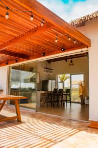 HOP PRAIA exclusiva laguna y playa en Chincha