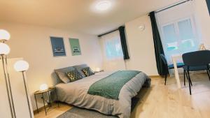 Appartements Studio 404 - Cosy - Free Wifi - Proche Stellantis / Faurecia : photos des chambres