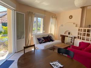 Maisons de vacances La plage au bout du jardin / Sword Beach cottage : photos des chambres