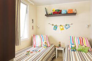 Campings Village Camping La Roseraie : photos des chambres