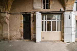 Appartements Centre historique - Cour privee - Arrivee autonome : photos des chambres