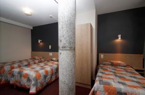 Hotels Hotel Montfort : photos des chambres