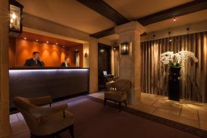 Hotels Le Pavillon de la Reine & Spa : photos des chambres