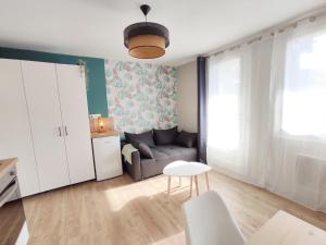 Appartements Magnifique studio face au parc thermal : photos des chambres