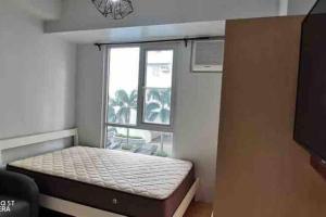 Minimalist 1 Bedroom in Alabang near Molito and ATC with WiFi & Netflix m