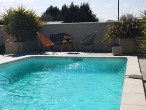 Maisons de vacances Appartement au dessus de la maison du Saunier : photos des chambres