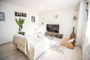 Appartements Appt Ambiance boheme 2 ch Piscine lagon : photos des chambres