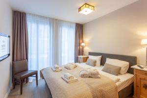 Standard Suite Type I (One double bed and one bunk bed) (free kids club) room in Suite Hotel Binz Familienhotel Rügen klimaneutral