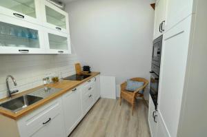 Uroczy Apartament w Sopockiej Kamienicy