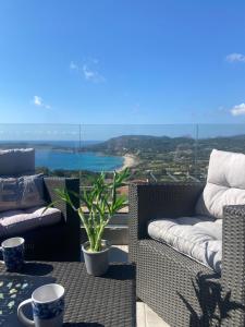 Appartements Haut de Villa - Vue mer avec Coucher de Soleil : photos des chambres