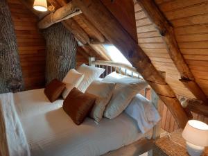 Chalets Cabane suspendue dans les arbres : photos des chambres