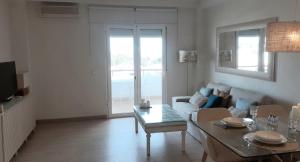 APARTAMENTO- ATICO EN MIJAS COSTA , CON PISCINA.