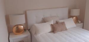 APARTAMENTO- ATICO EN MIJAS COSTA , CON PISCINA.