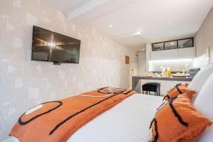 Appartements Yuna Les Halles - Serviced Apartments : photos des chambres