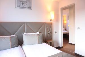 Hotels Timhotel Paris Gare Montparnasse : photos des chambres