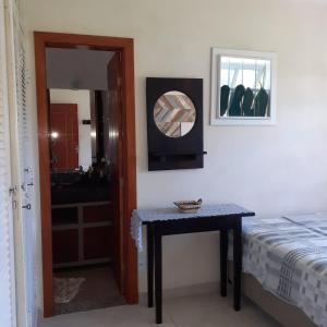 Casa de praiacampo com piscina e gramado