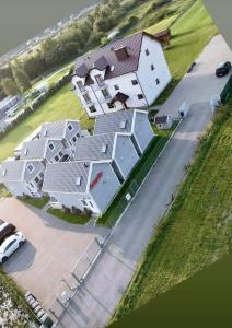 Domki i pokoje Angelo z sauną i jacuzzi- Karwia