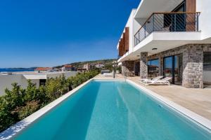 Seaview Villa Dolac with heated pool, a Hot tub, Finnish sauna and Billiards