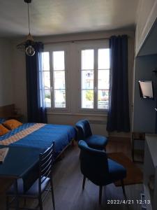 Appartements Studio 10, tres bien place, parking wifi gratuit : photos des chambres