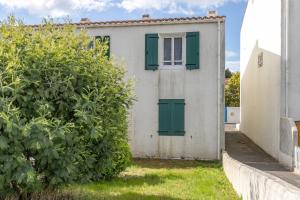 Appartements Au coeur de l'Ile, appartement lumineux pour quatre personnes : photos des chambres