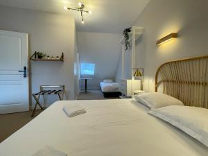 Maisons d'hotes Maison des fleurs : photos des chambres