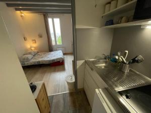 Appartements Le cosy- calme, ideale couple, business, longs sejours( WIFI, Netflix, stationnement public gratuit) : photos des chambres